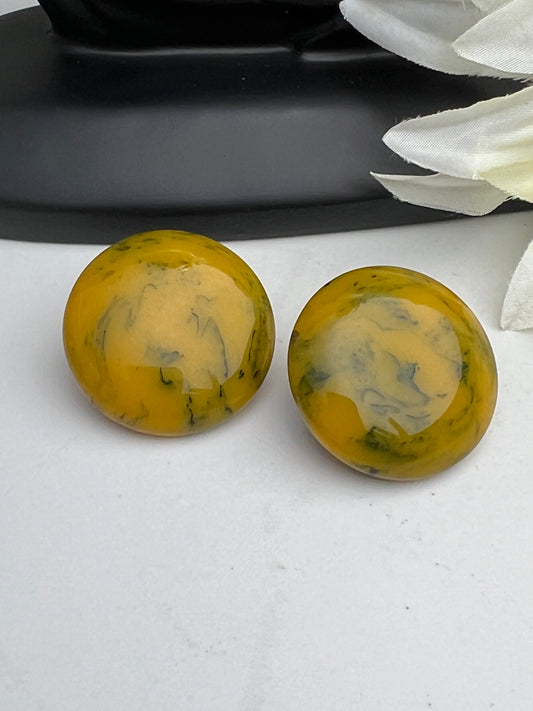 Mid-Century Black and Yellow Marbled Bakelite Clip on Earrings