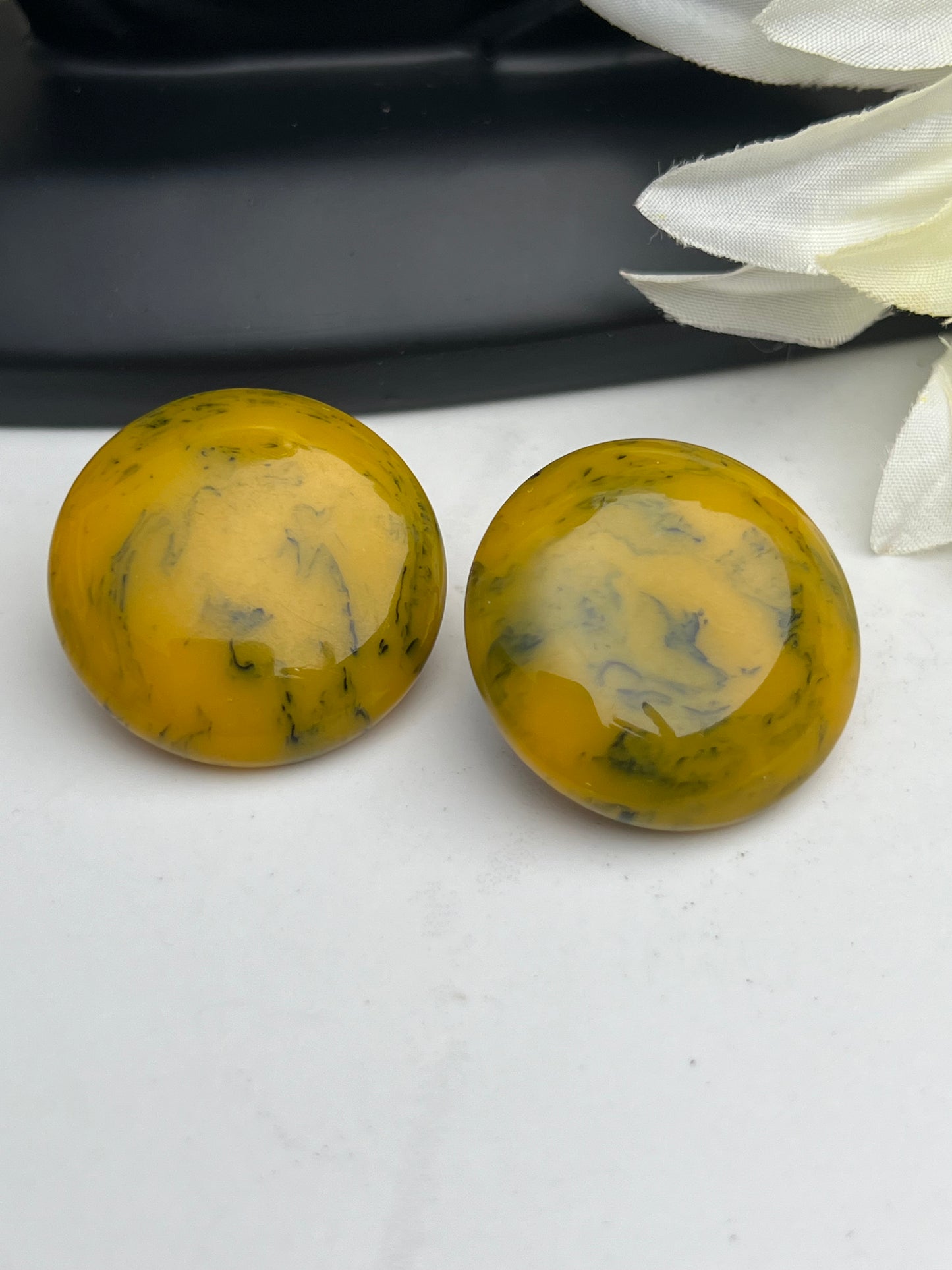 Mid-Century Black and Yellow Marbled Bakelite Clip on Earrings