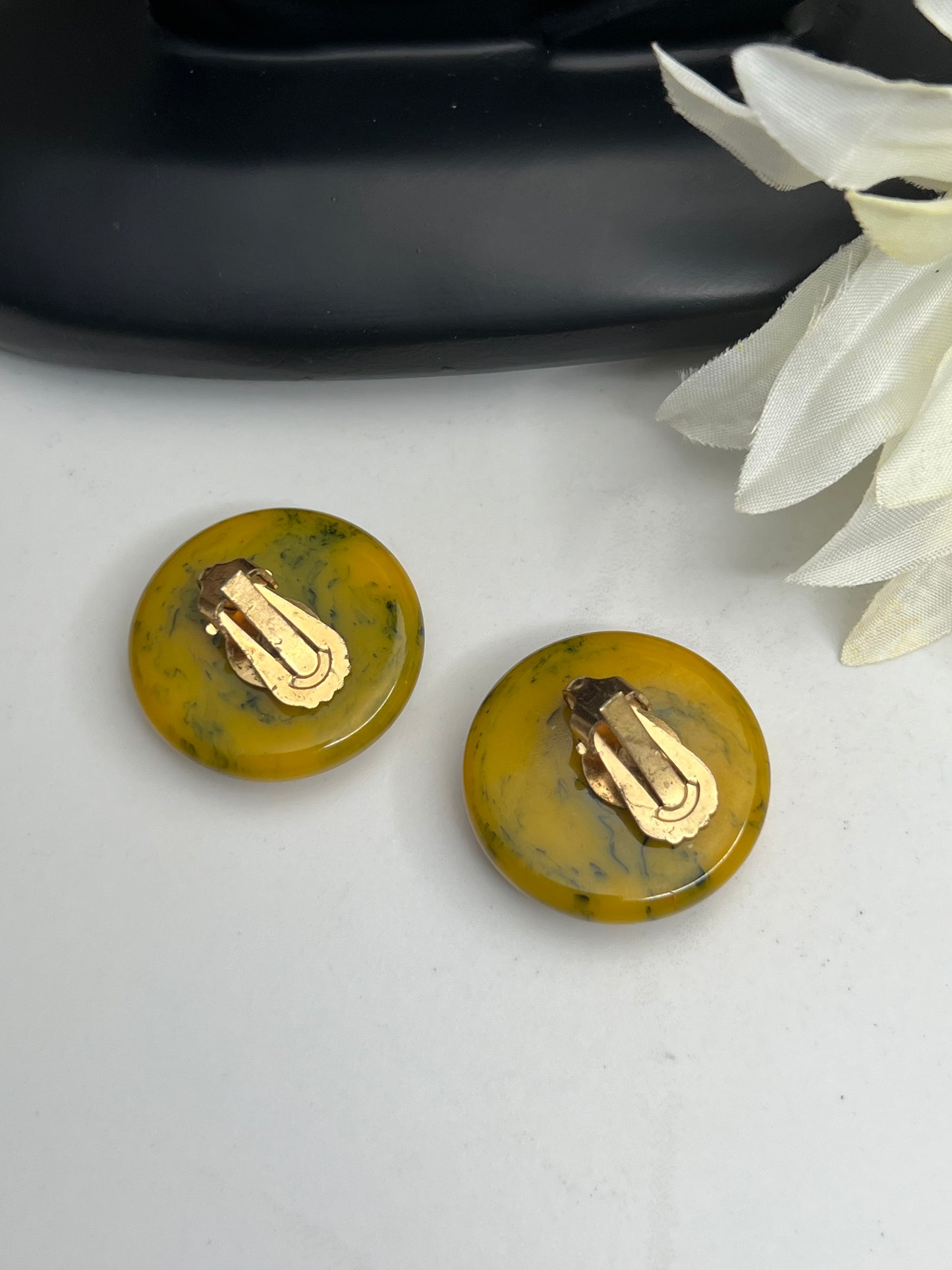 Mid-Century Black and Yellow Marbled Bakelite Clip on Earrings