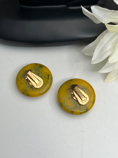 Mid-Century Black and Yellow Marbled Bakelite Clip on Earrings