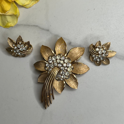 Signed Trifari Gold Rhinestone Starburst Flower Brooch and Clip on Earrings