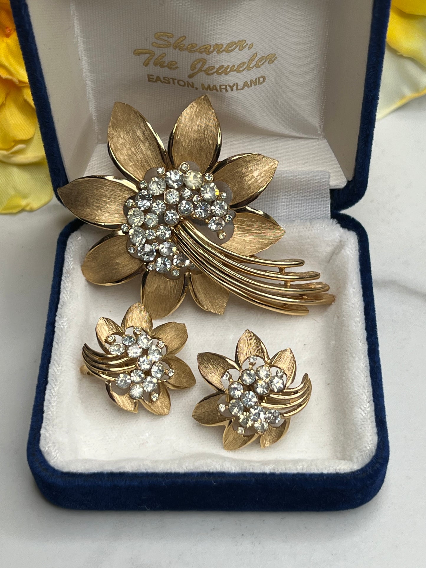 Signed Trifari Gold Rhinestone Starburst Flower Brooch and Clip on Earrings